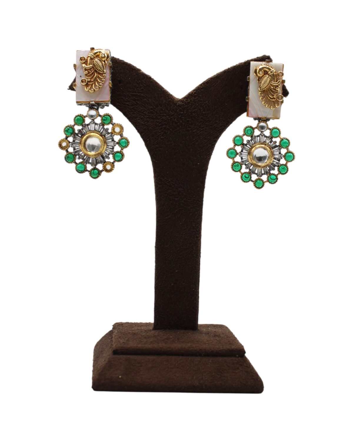 Elegant Gold and Green Floral Earrings Displayed on Stand