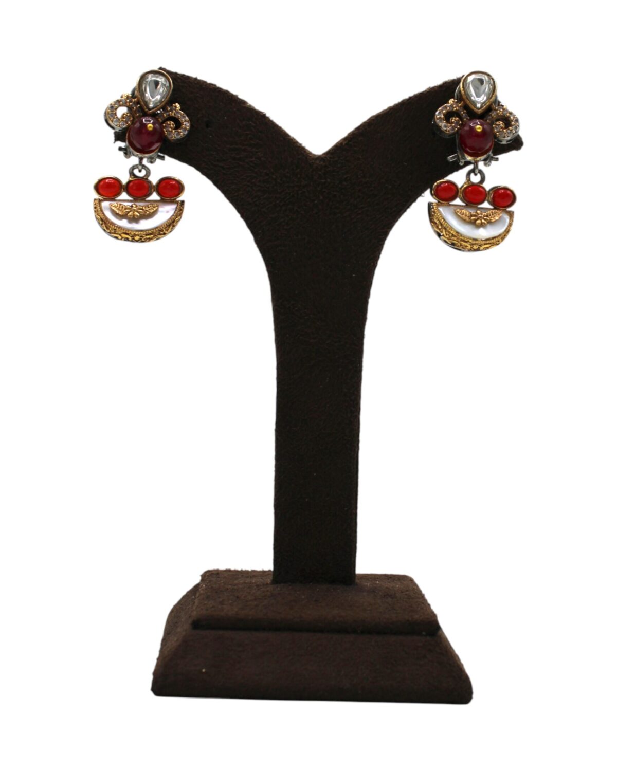 Elegant Red and Gold Chandelier Earrings Displayed on Stand