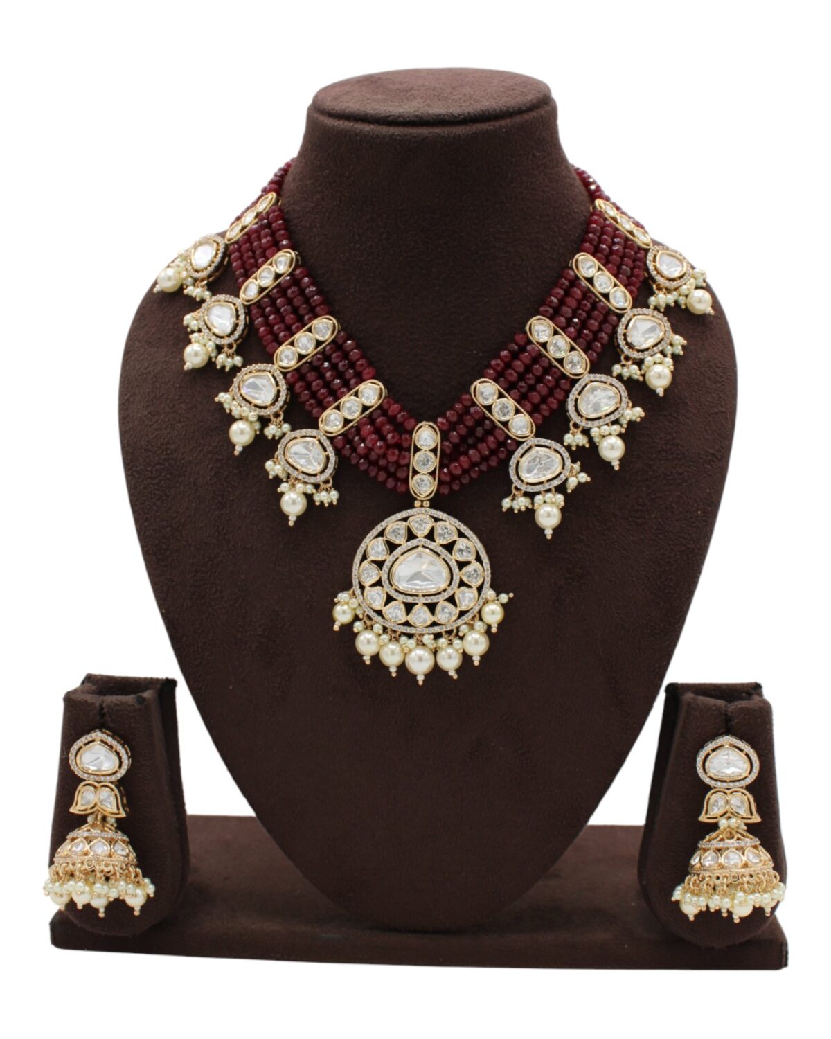 Elegant Traditional Jewelry Set with Red Beads and Intricate Gold Accents
