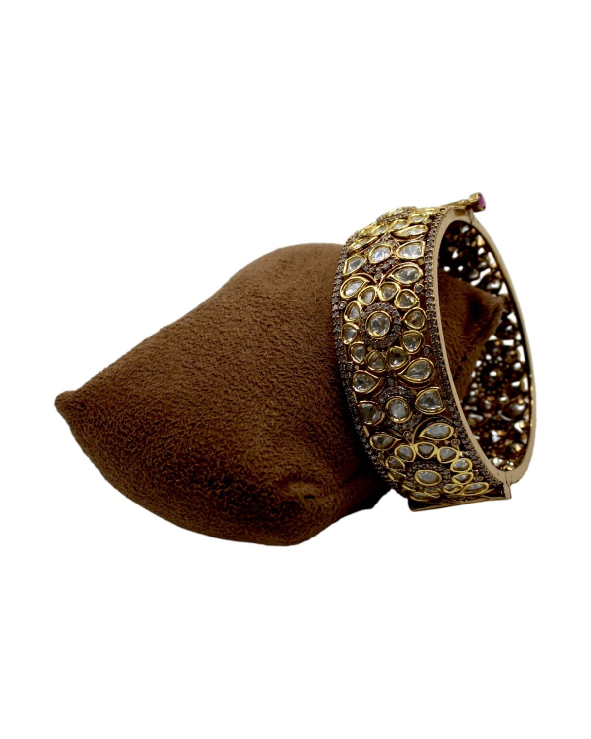 Elegant Antique Gold and Gemstone Bangle on Velvet Display