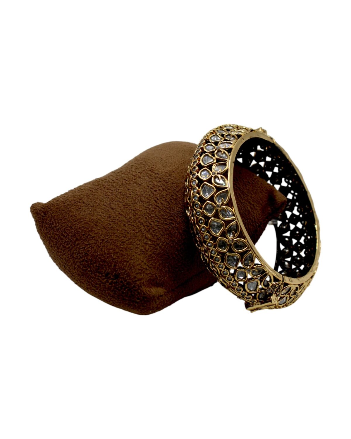 Elegant Gold and Stone-Studded Bangle on Velvet Pouch
