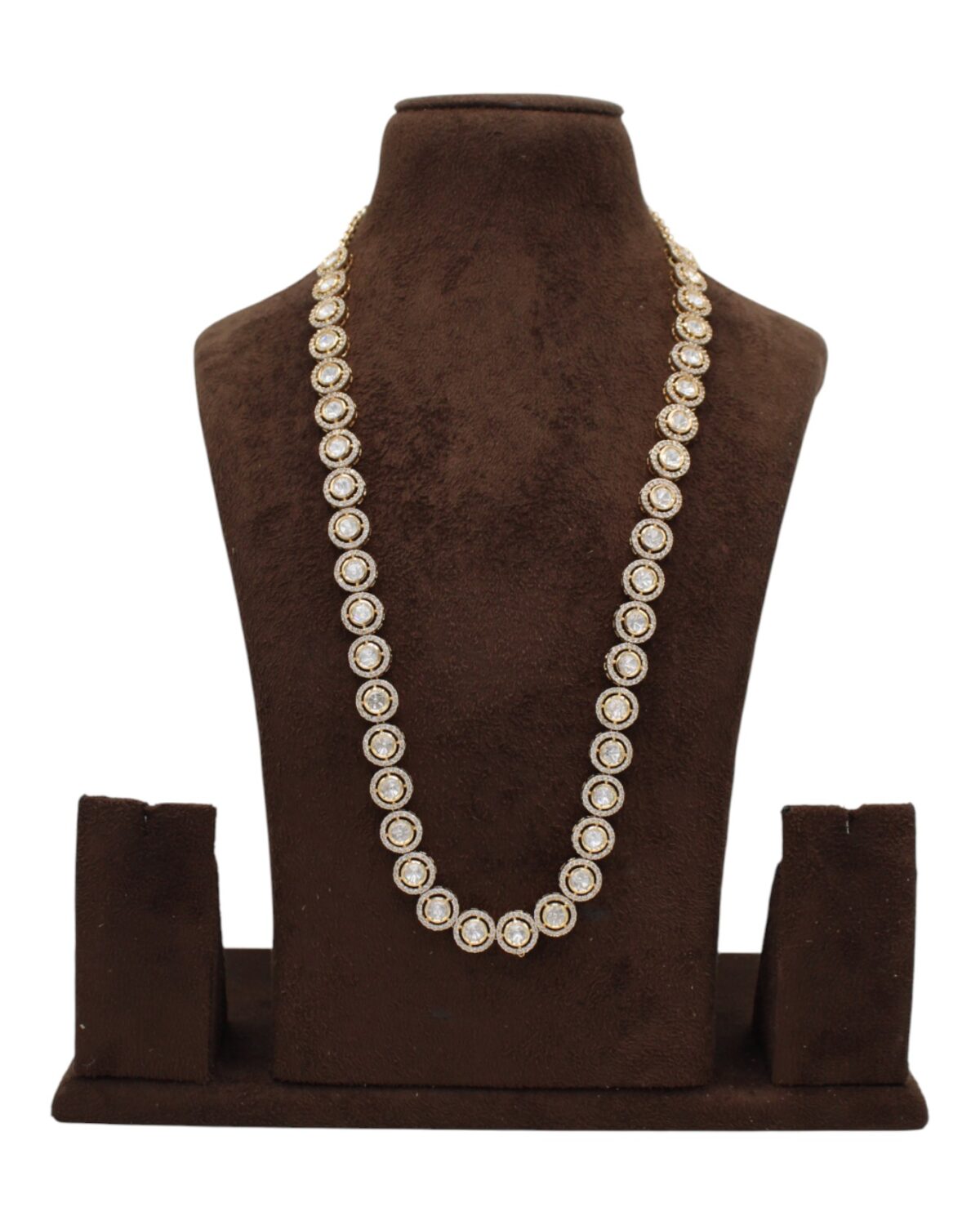 Elegant Gold and Diamond Necklace Displayed on a Bust Stand
