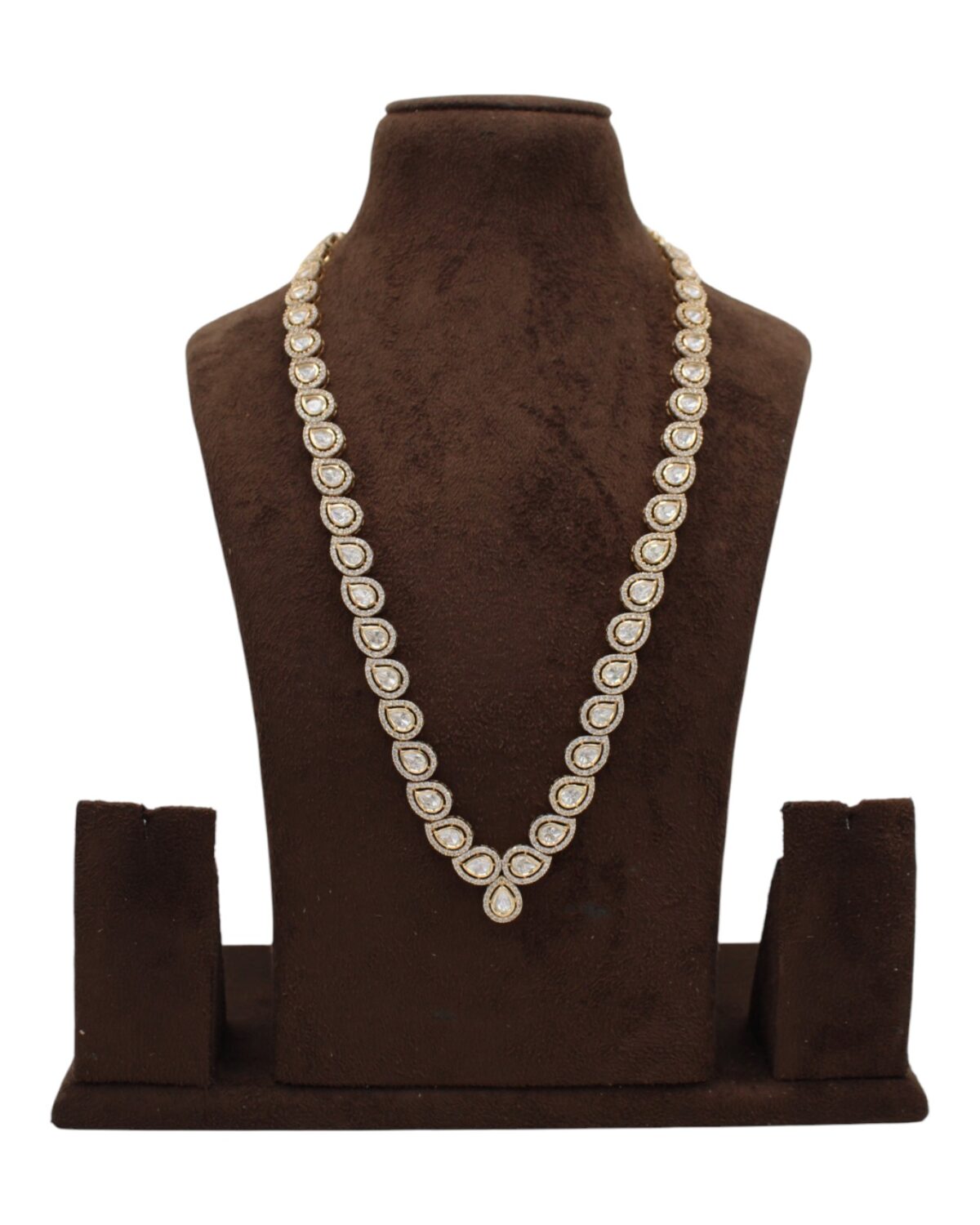 Elegant Pearl-Studded Necklace Displayed on a Velvet Stand