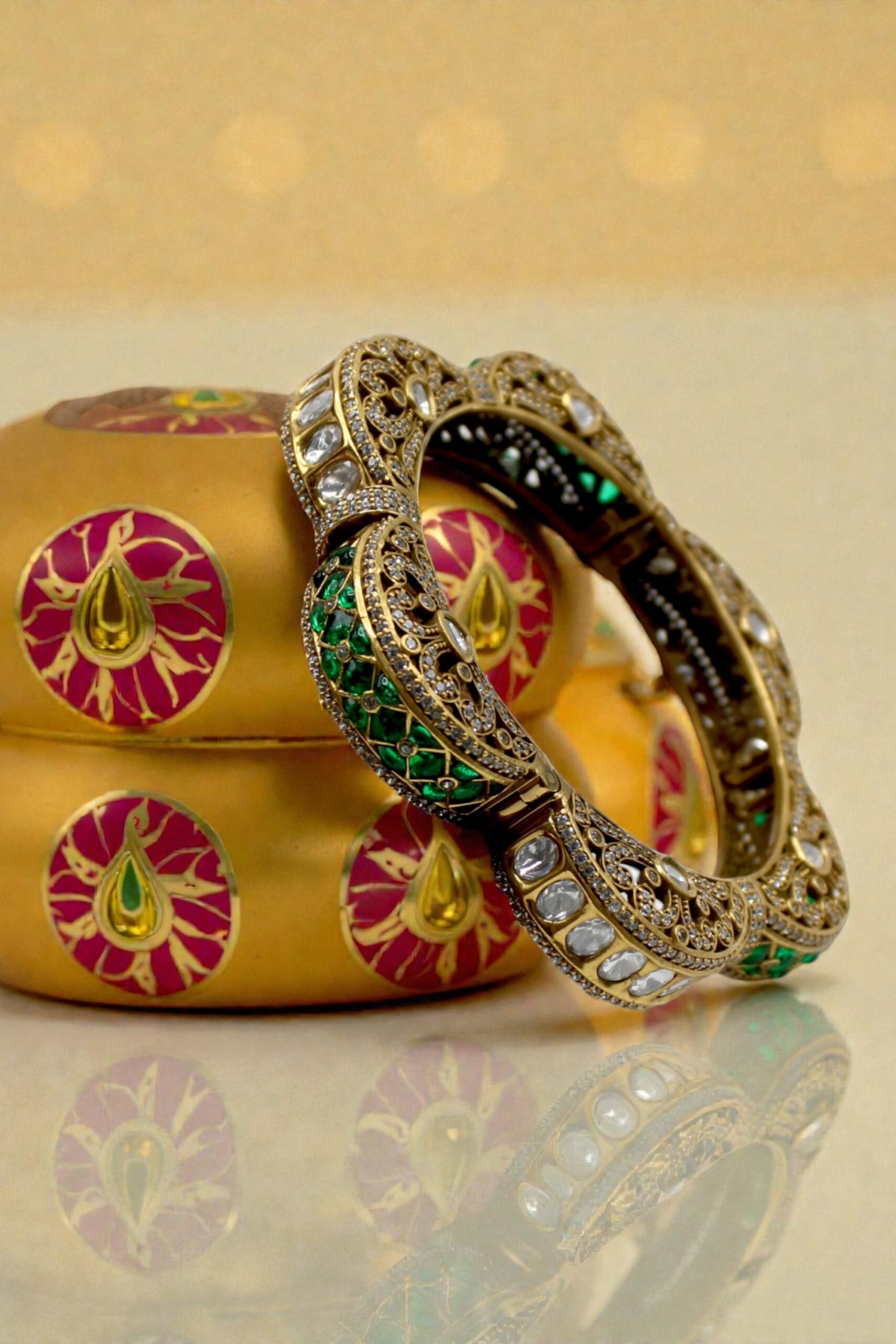 Elegant Gold and Green Enamel Bangle on Velvet Display - Image 2