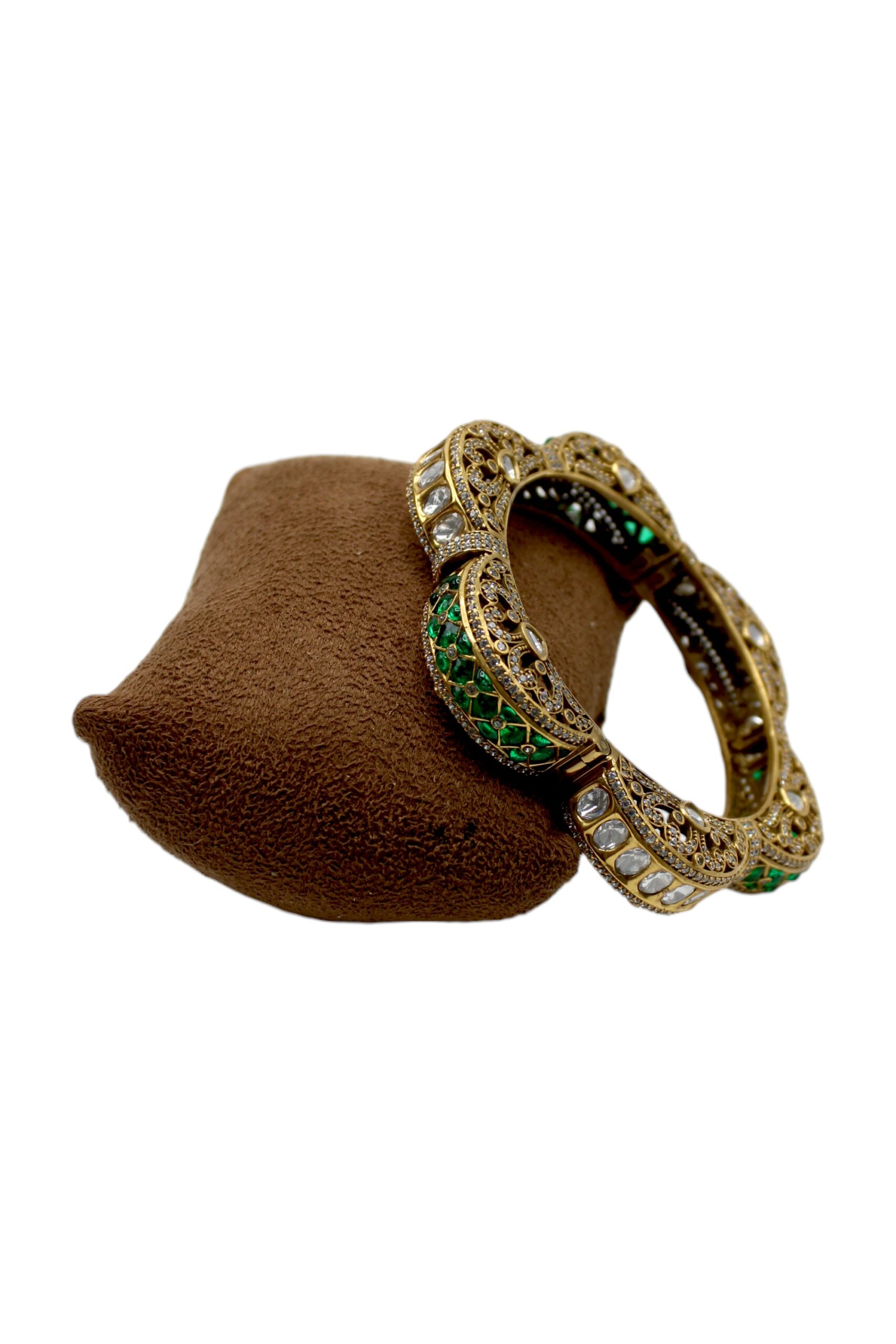 Elegant Gold and Green Enamel Bangle on Velvet Display