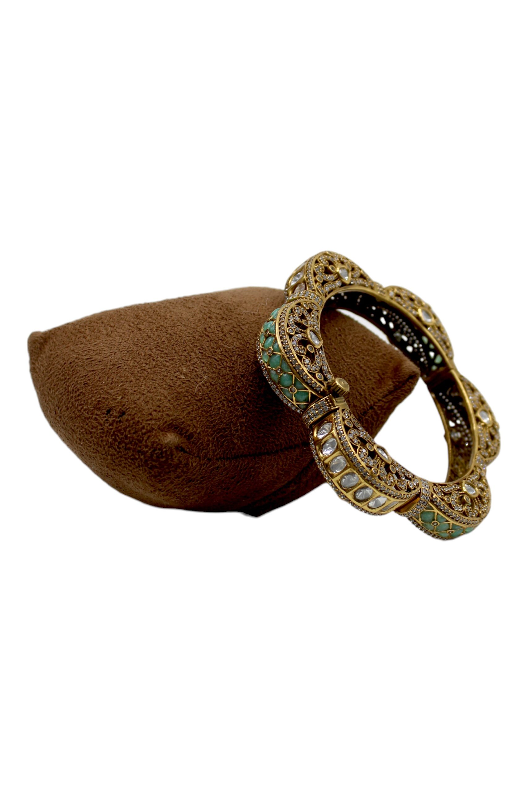 Intricately Designed Antique Bangle with Green and White Stones
