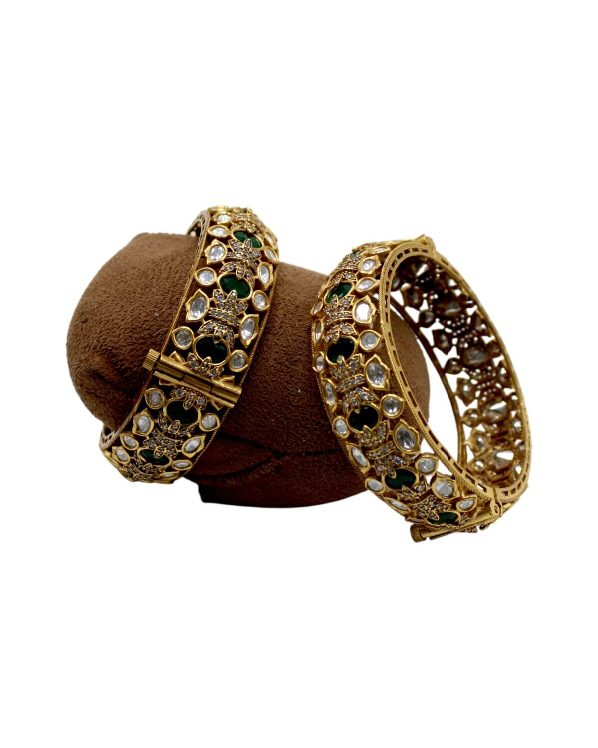 Elegant Gold Bangles with Intricate Design and Gemstone Accents