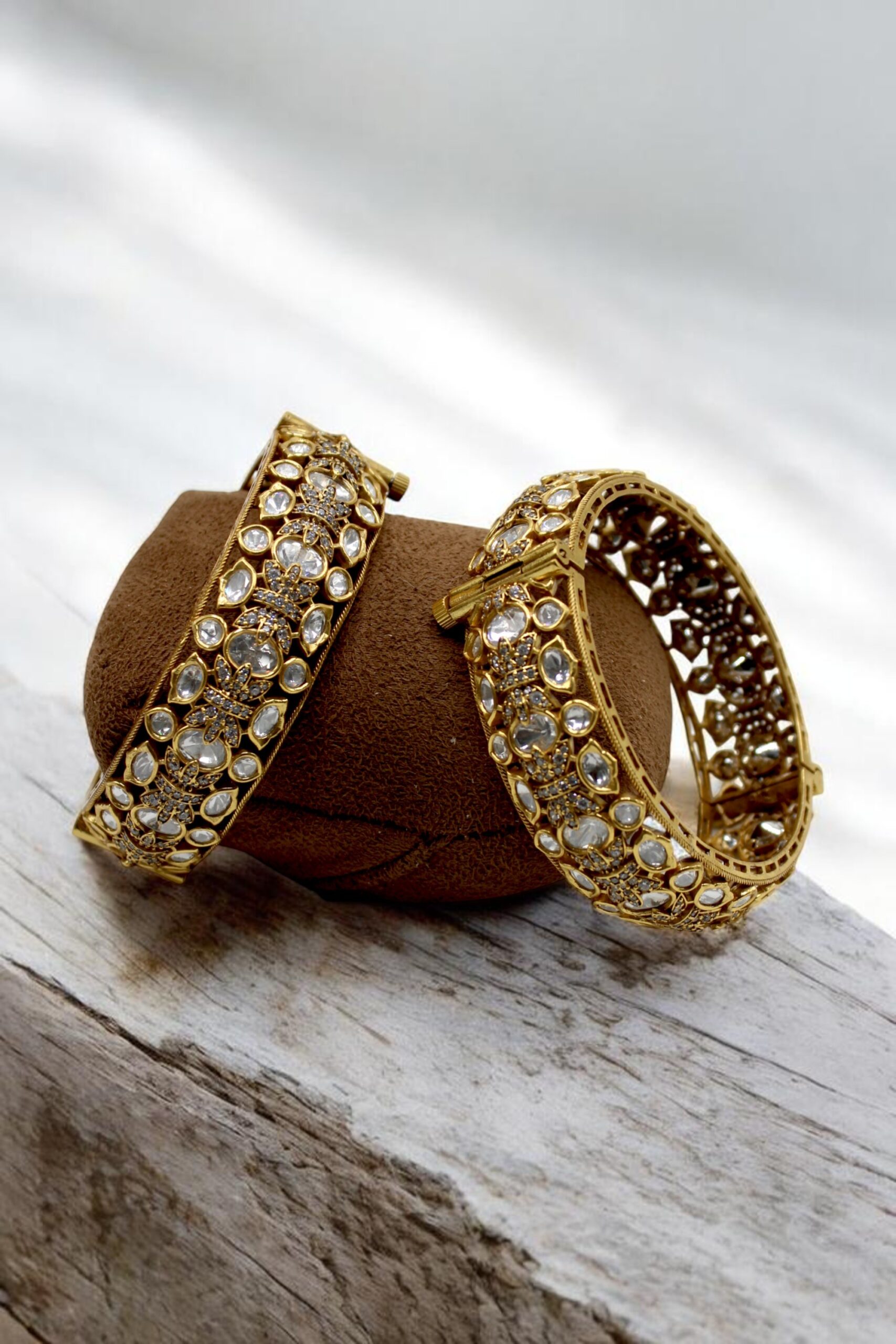 Elegant Gold Bangles Adorned with Sparkling Stones - Image 3