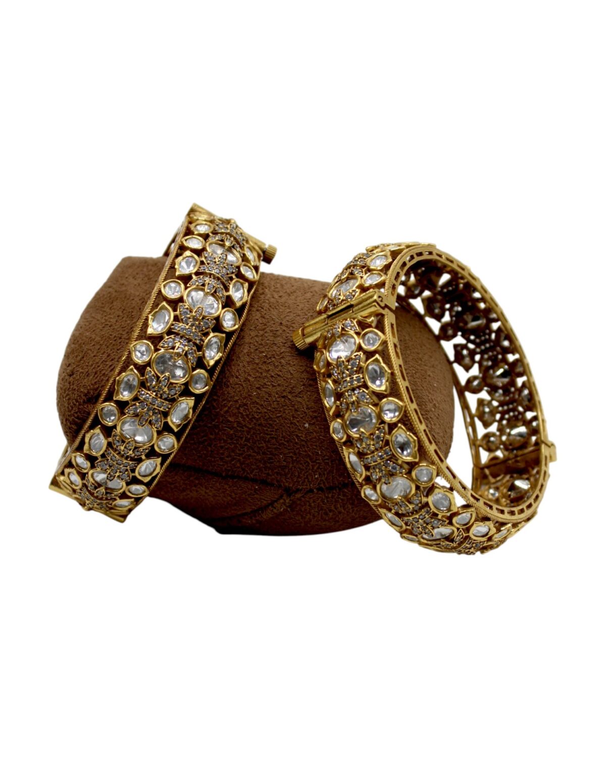 Elegant Gold Bangles Adorned with Sparkling Stones