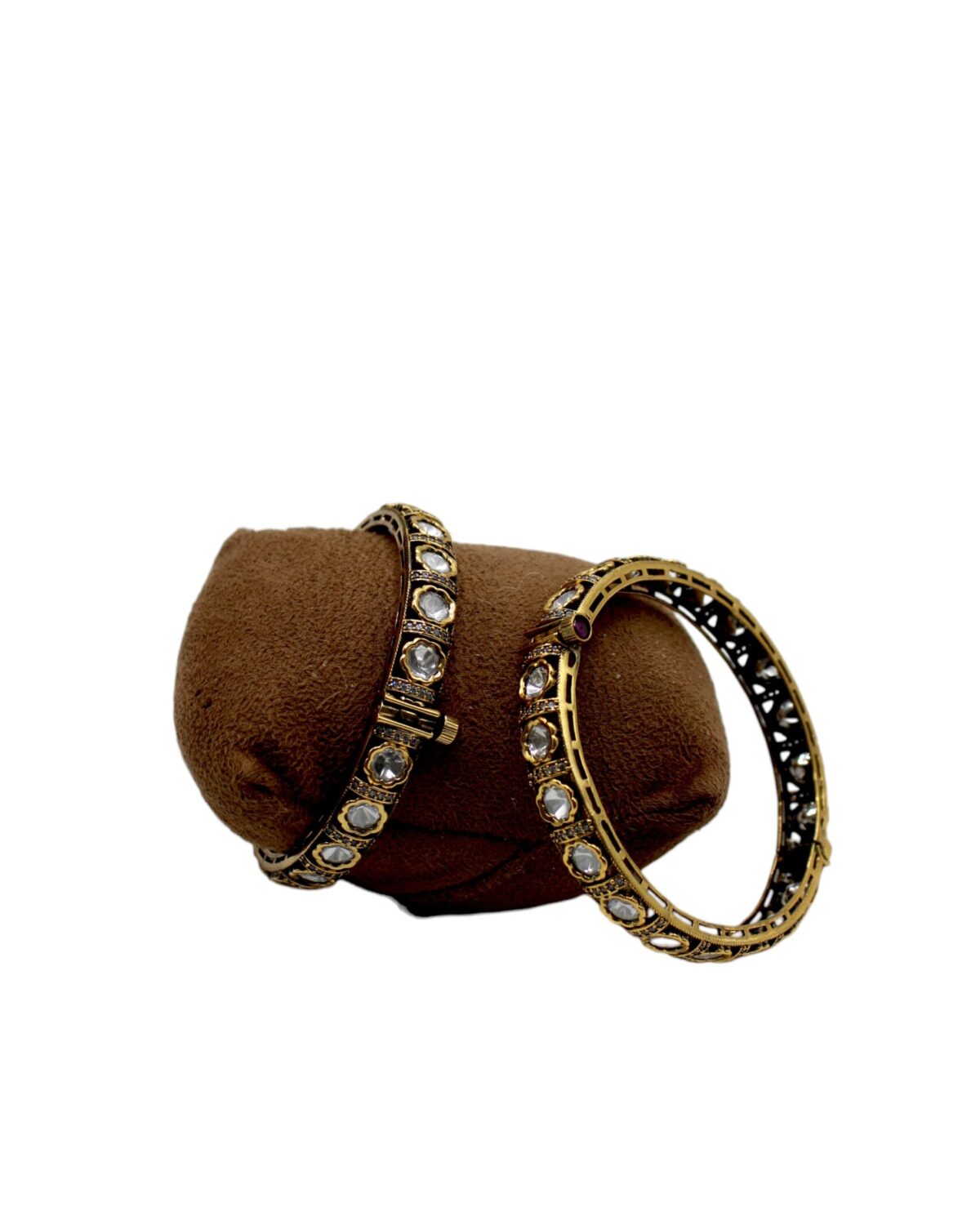 Elegant Gold and Diamond Bangles on Display