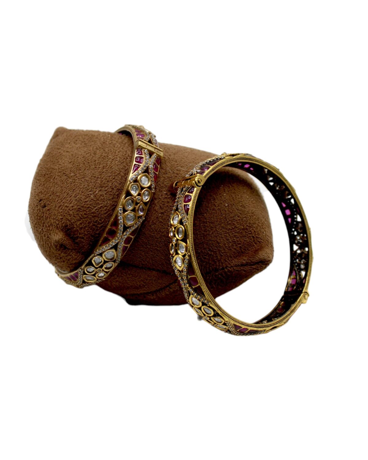 Elegant Gold Bangles Adorned with Gemstones