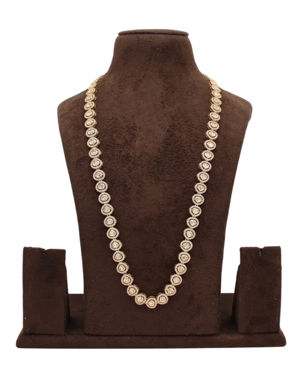 Elegant Gold Necklace Displayed on a Bust Stand