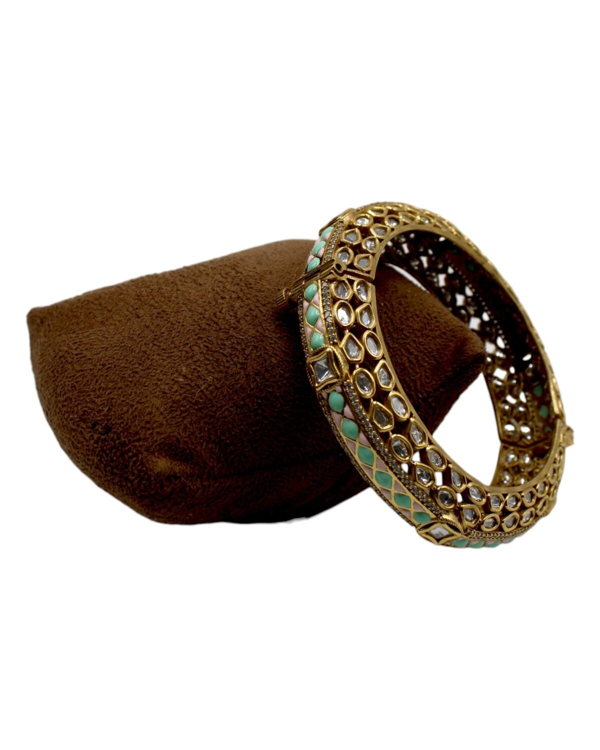 Elegant Gold and Turquoise Bangle on Velvet Pouch