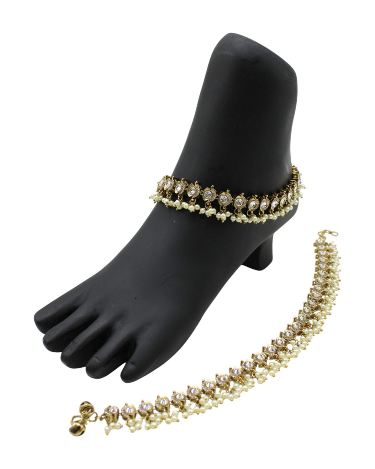 Elegant Traditional Anklets Displayed on a Foot Model