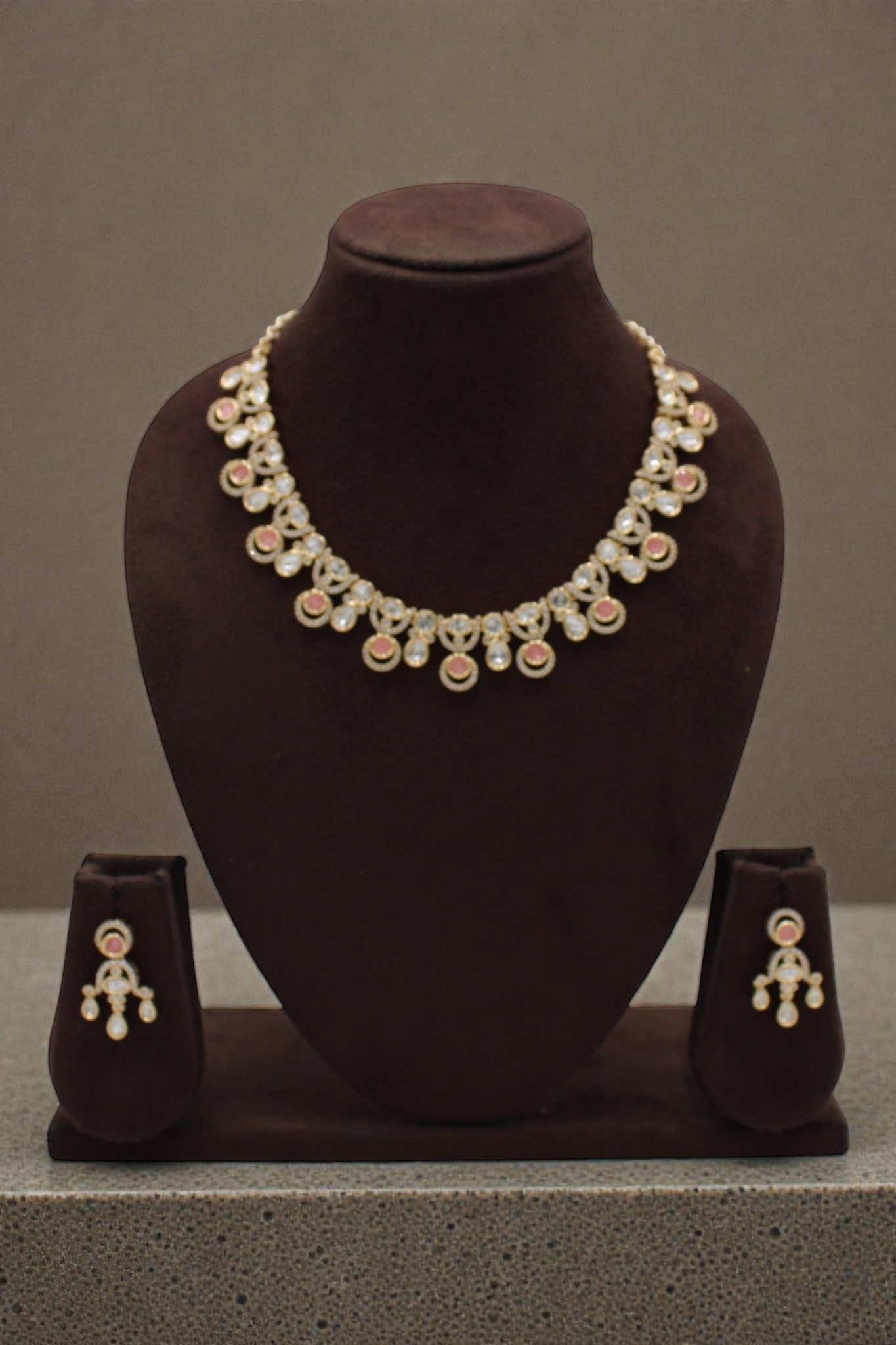 Elegant Gold and Pearl Necklace Set Display - Image 3