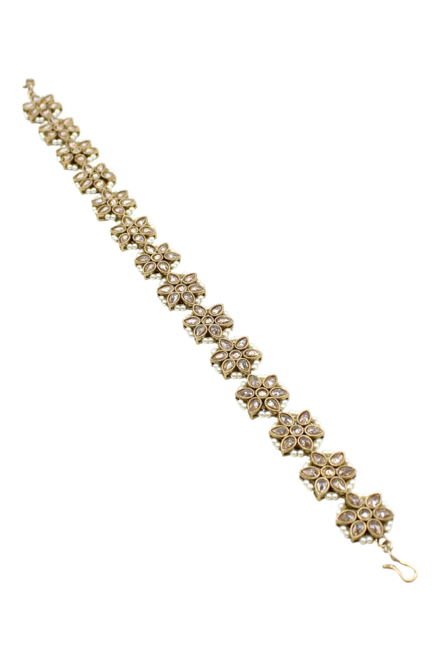 Elegant Floral Design Bracelet in Gold Tone