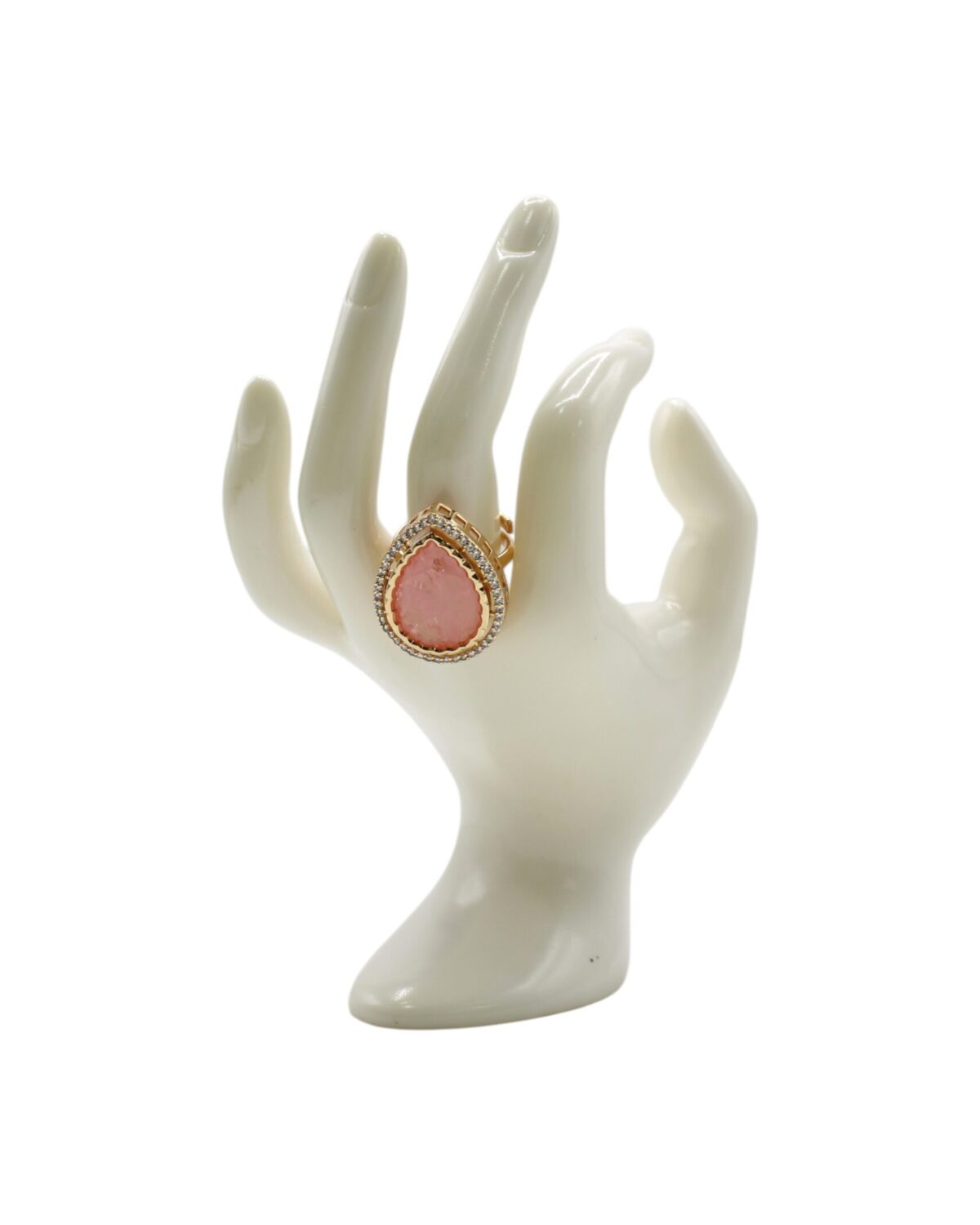 Elegant Pink Teardrop Ring Displayed on a Decorative Hand