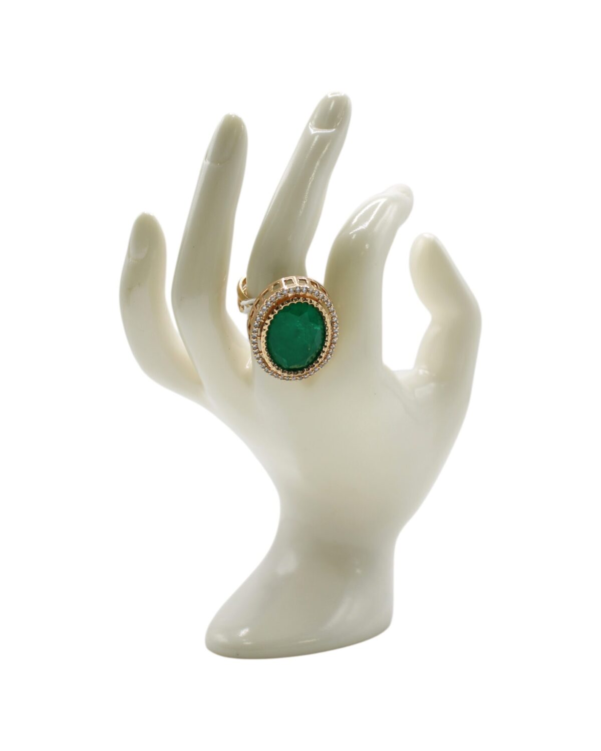 Elegant Green Stone Ring Displayed on a Decorative Hand