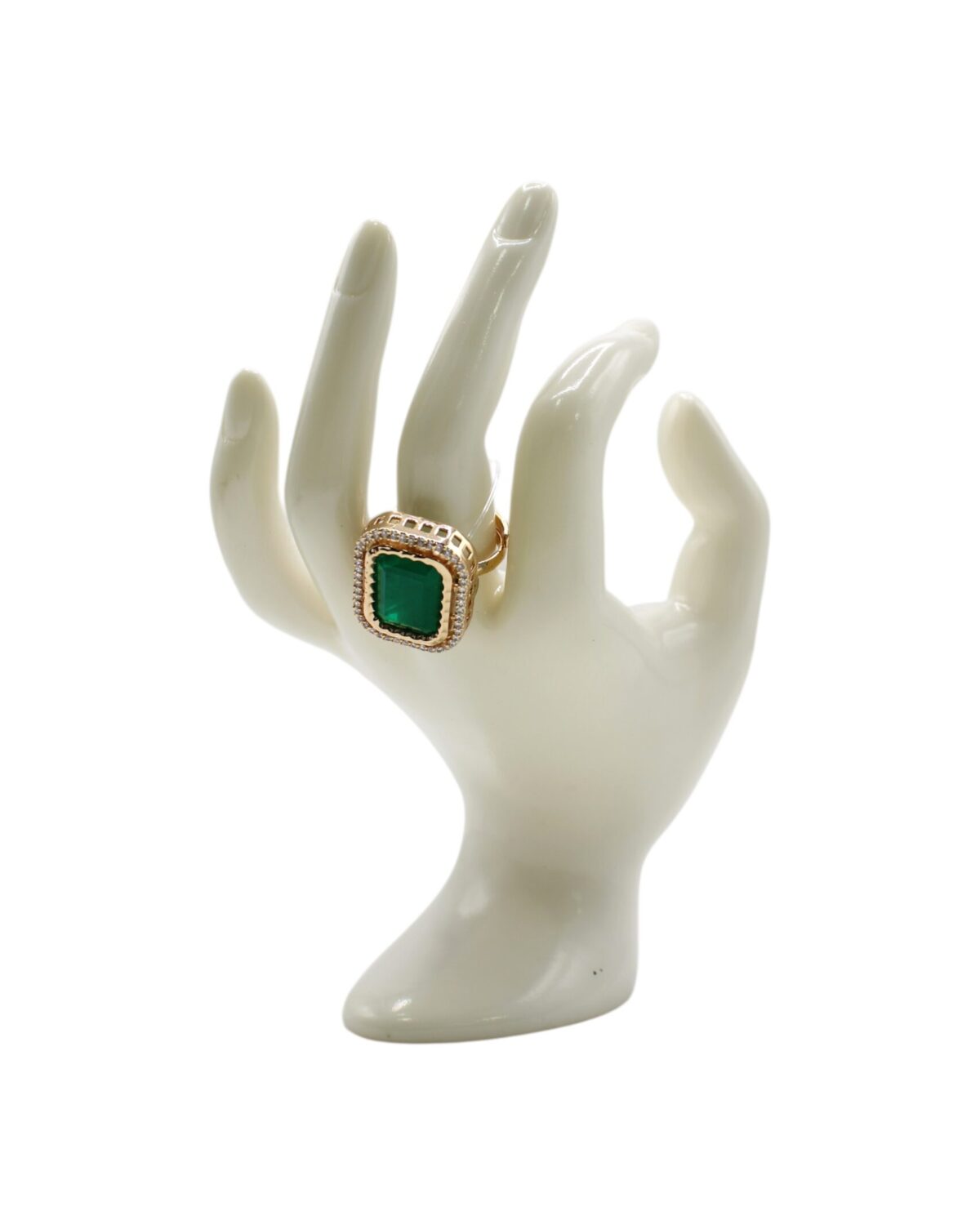 Elegant Green Stone Ring Displayed on a Decorative Hand