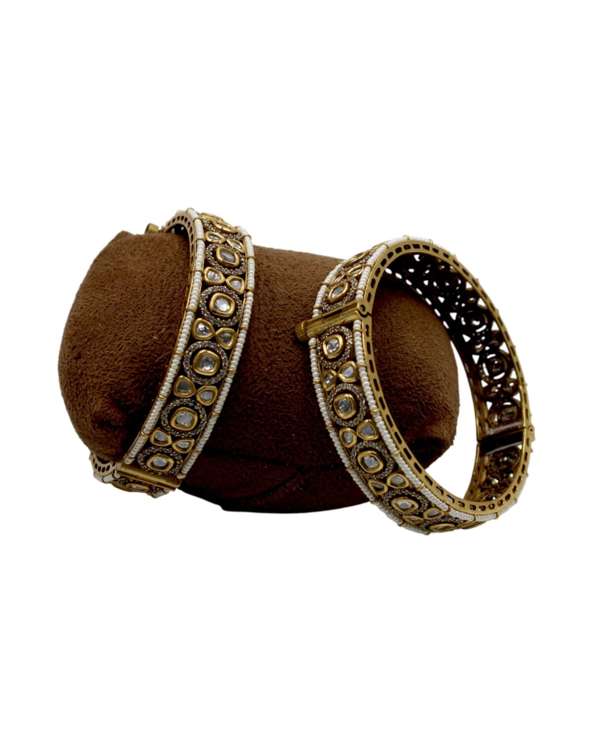 Elegant Gold and Diamond Bangles on Display