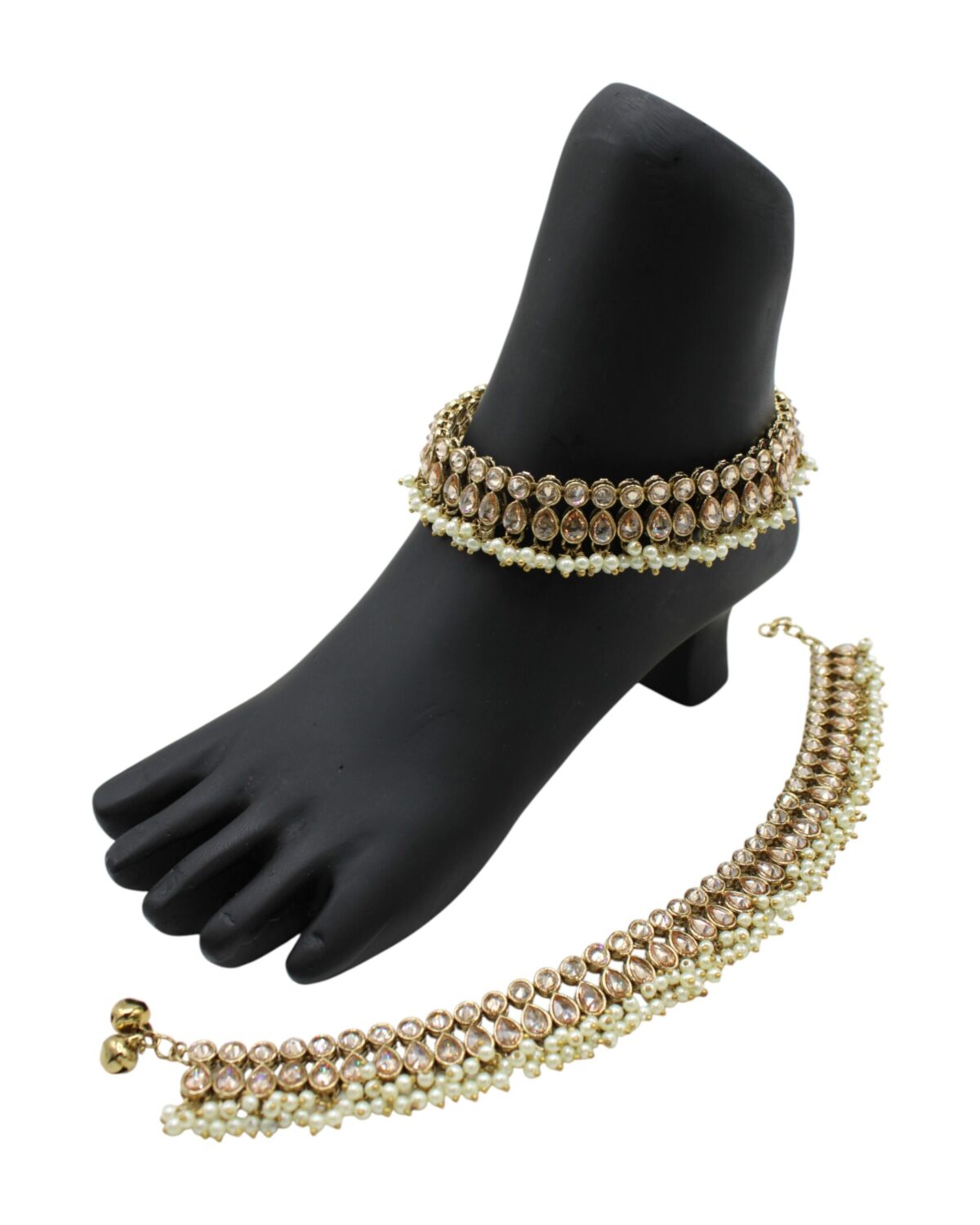 Elegant Gold and Pearl Anklet Set Displayed on a Foot Model