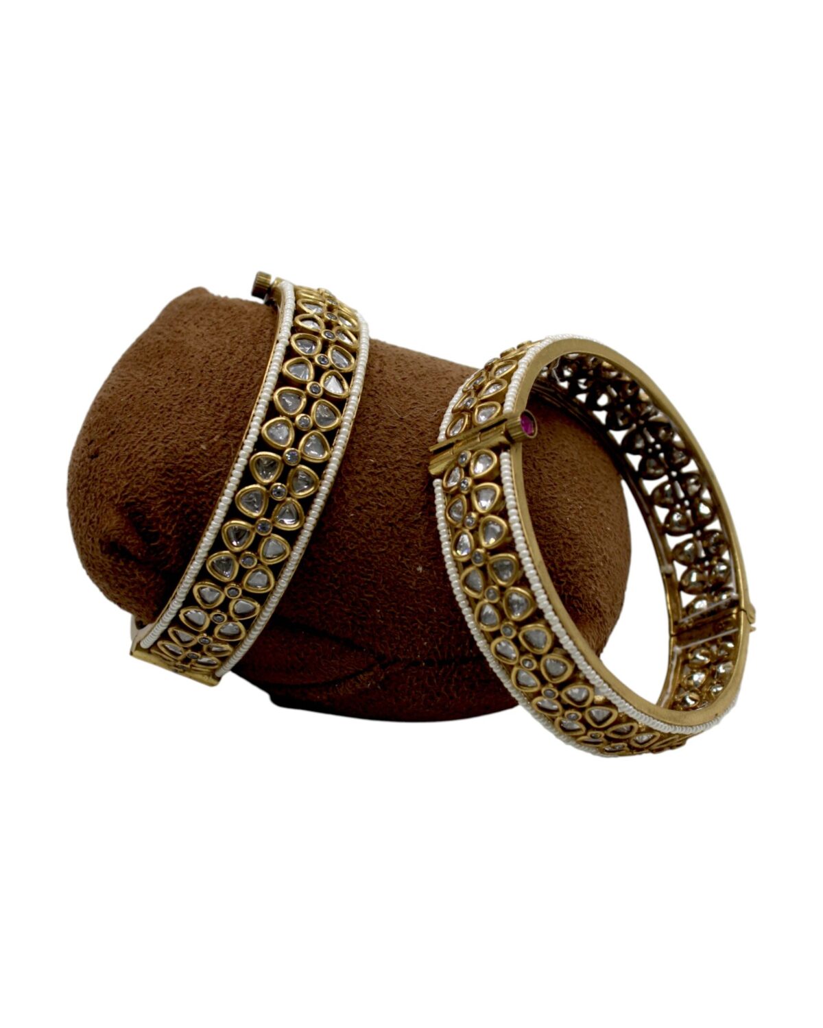 Elegant Gold and Diamond Bangles on Display