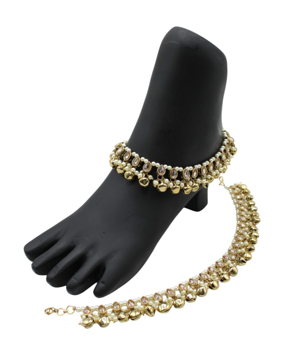Elegant Gold Anklets Displayed on a Foot Model