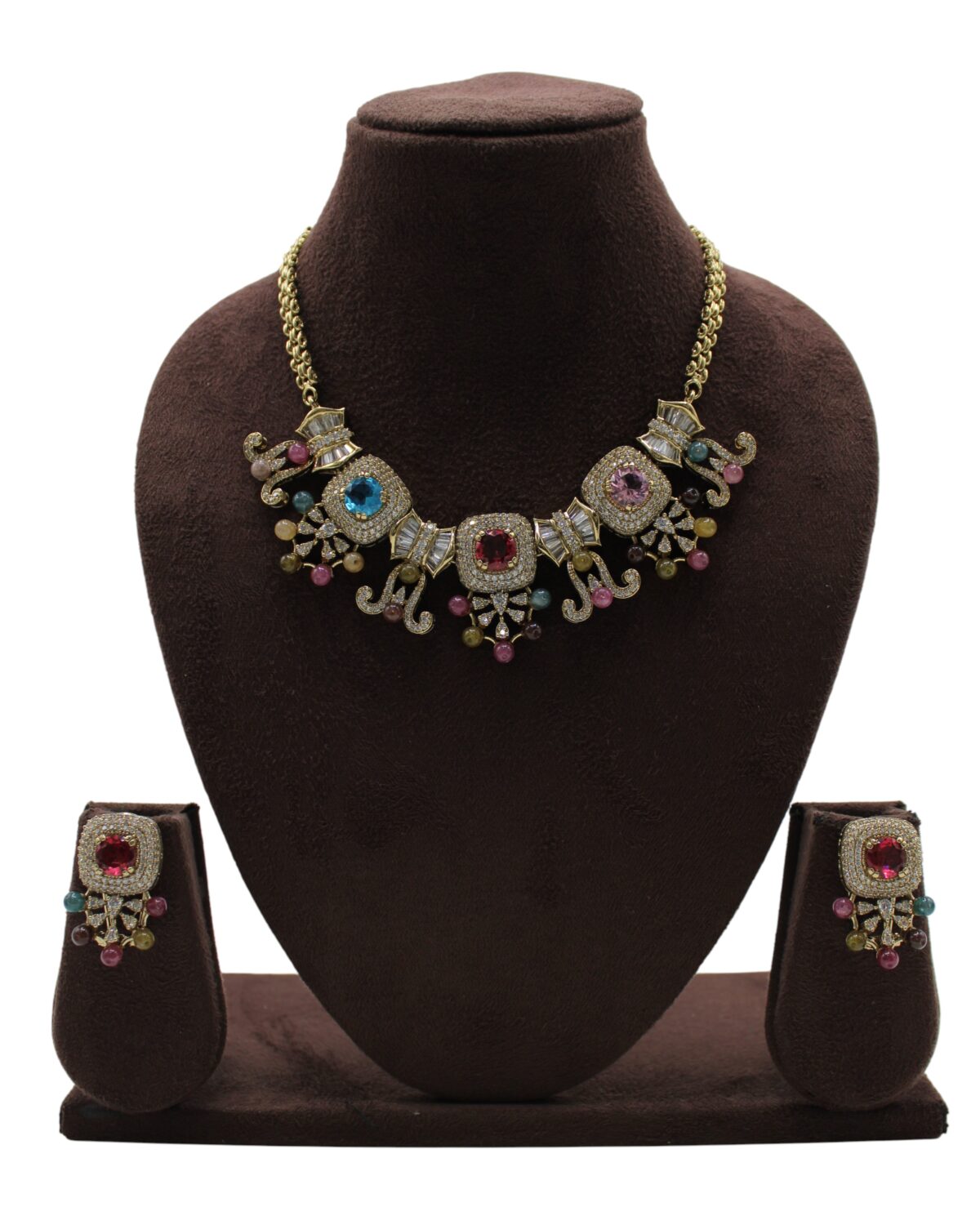 Elegant Multicolored Jewelry Set Displayed on a Velvet Bust
