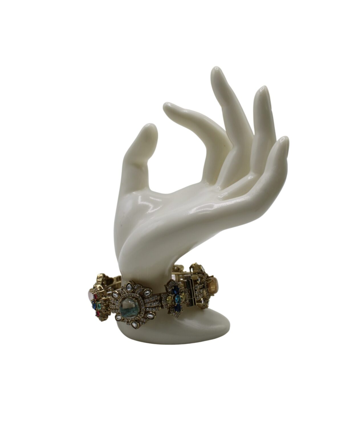 Elegant Display of Vintage Jewelry on a Sculpted Hand