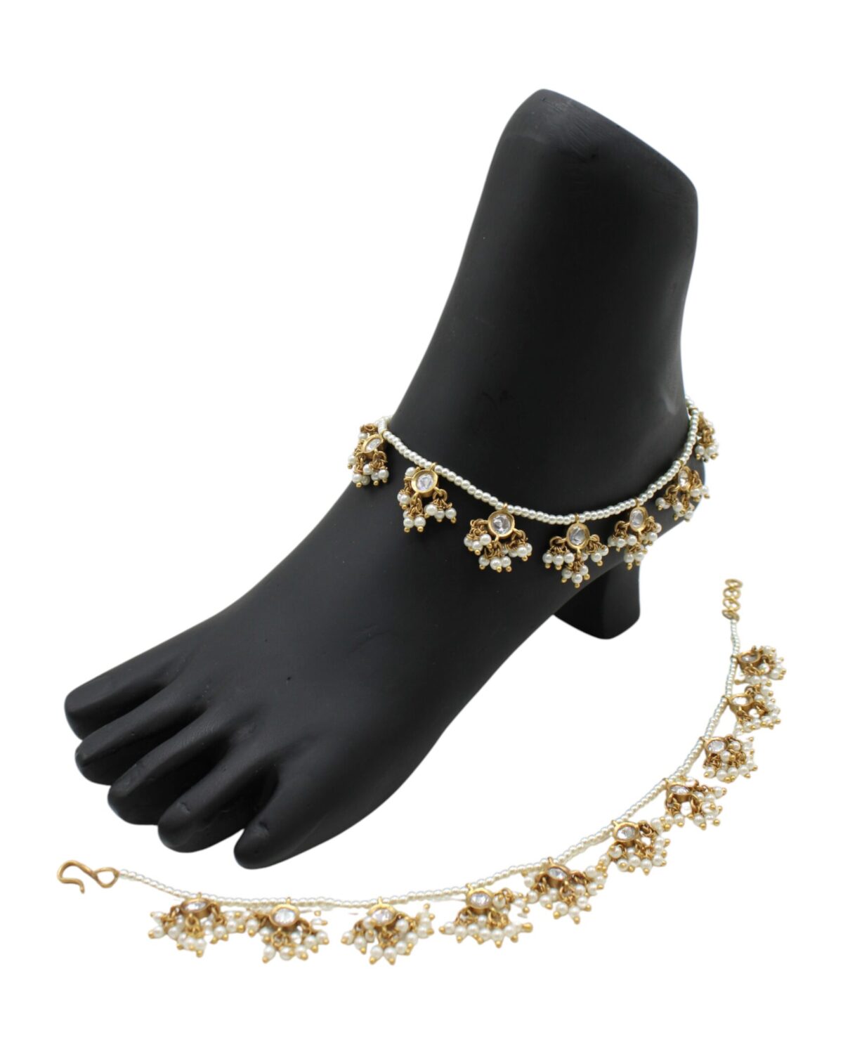 Elegant Gold and Pearl Anklet Display