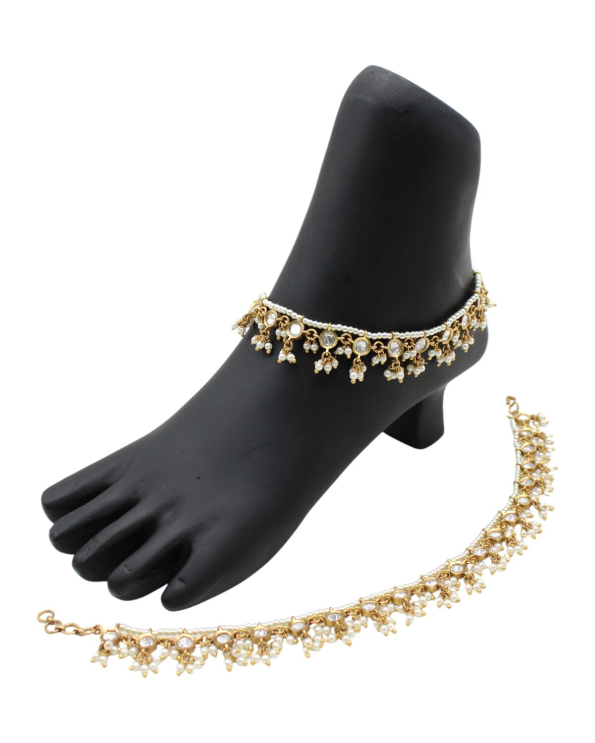 Elegant Gold and Pearl Anklet Display